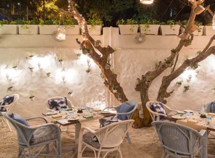 Best date night spots in Mumbai featuring Olive Bar & Kitchen, Bayview Cafe, and The Backyard Brew